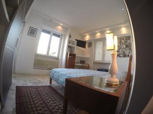 Kuchyň nebo kuchyňský kout v ubytování B&B Rosa Blu