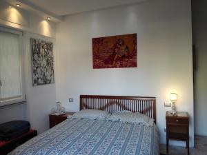 Postel nebo postele na pokoji v ubytování B&B Rosa Blu