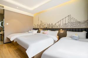 Postel nebo postele na pokoji v ubytování Meego Smart Select Hotel