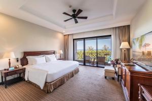 Ein Bett oder Betten in einem Zimmer der Unterkunft Vinpearl Resort & Spa Phu Quoc