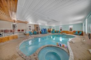 a large swimming pool in the middle of a room at Marmora and Lake Inn and Victorian Diner in Marmora