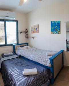 Ένα ή περισσότερα κρεβάτια σε δωμάτιο στο my vacation home +24 φωτογραφίες