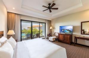 Ein Bett oder Betten in einem Zimmer der Unterkunft Vinpearl Resort & Spa Phu Quoc