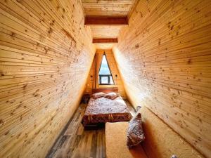 Cabana A-Frame Refugiu Montan 객실 침대