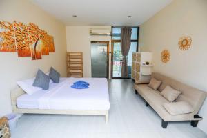 Ένα ή περισσότερα κρεβάτια σε δωμάτιο στο Phangan Arena Hostel +82 φωτογραφίες