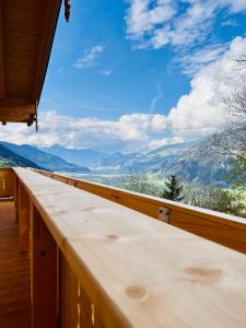 a balcony with a view of the mountains at AmStein in Kaltenbach