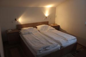 Letto o letti in una camera di Rooms Zebax