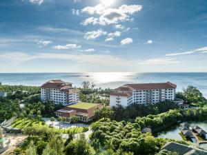 an aerial view of a resort with the ocean in the background at Vinpearl Resort & Spa Phu Quoc in Phu Quoc