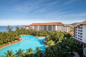 an aerial view of a resort with a large swimming pool at Vinpearl Resort & Spa Phu Quoc in Phú Quốc