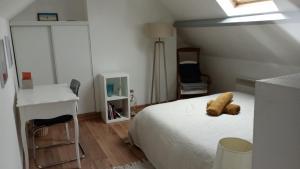 Posteľ alebo postele v izbe v ubytovaní Charmant cocon à Malo-les-bains