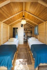 Posteľ alebo postele v izbe v ubytovaní Nisi Glamping
