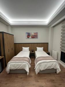 Cama o camas de una habitación en Akel Guest House