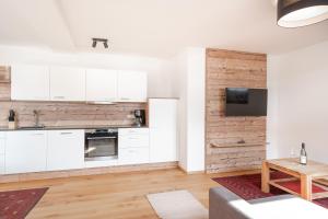 Kuchyňa alebo kuchynka v ubytovaní Penthouse Ski&Nature "Weisseneck"