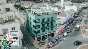 a building with a sign on it on a city street at Seaside Views in Galway