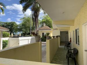 una vista desde el balcón de una casa en Relax in Jamaica - Enjoy 7 Miles of White Sand Beach! villa en Negril