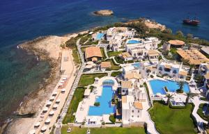 an aerial view of a villa on the ocean at Aldemar Knossos Villas in Hersonissos