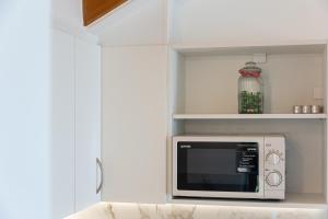 Kuchyň nebo kuchyňský kout v ubytování Apartment M&K