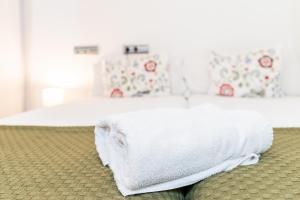 Ein Bett oder Betten in einem Zimmer der Unterkunft MONKÓ ON THE ROCK