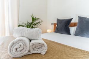 Ein Bett oder Betten in einem Zimmer der Unterkunft MONKÓ ON THE ROCK