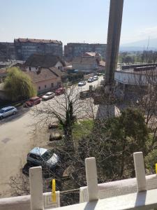a view of a parking lot with cars parked at Zgrada, stan in Kruševac