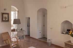 Posezení v ubytování Il Vicinato, casa vacanza immersa nel cuore dei Sassi