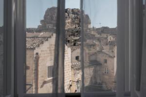 Fotografie z fotogalerie ubytování Il Vicinato, casa vacanza immersa nel cuore dei Sassi v destinaci Matera