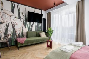 Posteľ alebo postele v izbe v ubytovaní Apartments City View Garbary by Noclegi Renters