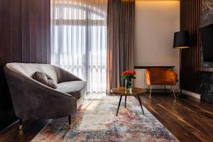Televízia a/alebo spoločenská miestnosť v ubytovaní Hotel Galicja Superior Wellness & Spa