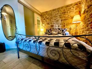 Кровать или кровати в номере City Rooms Šibenik