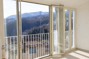a balcony with a view of a mountain at Laetitia Guesthouse in Sepino