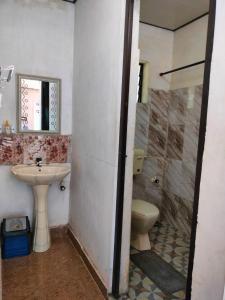 A bathroom at REST POINT HOMESTAY