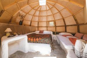 Posteľ alebo postele v izbe v ubytovaní Nisi Glamping