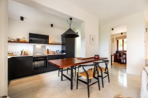 Кухня или мини-кухня в Casa Juliarina
