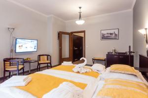 Posteľ alebo postele v izbe v ubytovaní Hotel Studanka