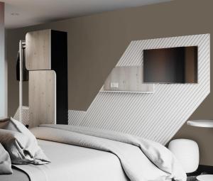 Llit o llits en una habitació de ibis Styles Porto Vecchio