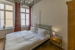 Un pat sau paturi într-o cameră la Albergo-Toscana