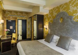 Postel nebo postele na pokoji v ubytování 45 Times Square Hotel