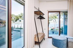 a living room with a view of the water at Vistamare Suite & Room in Marina di Campo