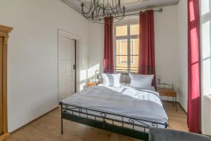 Un pat sau paturi într-o cameră la Albergo-Toscana
