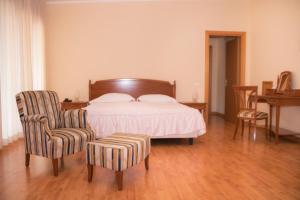 Postel nebo postele na pokoji v ubytování Ruggiero Park Hotel