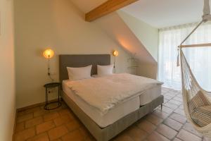 Un pat sau paturi într-o cameră la Albergo-Toscana