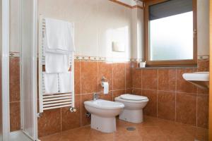 Koupelna v ubytování Ruggiero Park Hotel