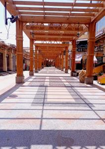 an empty train station with a large wooden structure at cozy apartment Aircon Downtown Aswan in Aswan