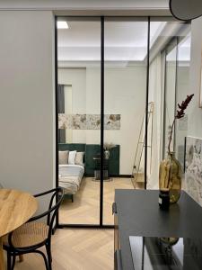 Posteľ alebo postele v izbe v ubytovaní AK Apartments