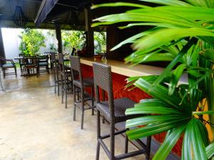 Ein Restaurant oder anderes Speiselokal in der Unterkunft Suite Lanka 