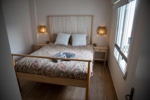 Ліжко або ліжка в номері Segovia 3