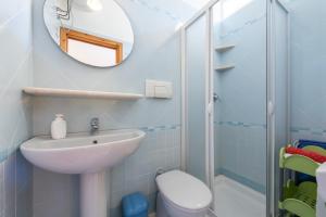 Koupelna v ubytování Domixedda + 19 fotografií