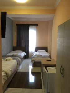 Voodi või voodid majutusasutuse RP HOTEL (NEW) toas