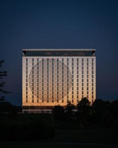 a large building with a large circle on it at Hotel La Tour in Milton Keynes