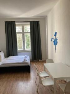 Postel nebo postele na pokoji v ubytování Erbenova Apartments